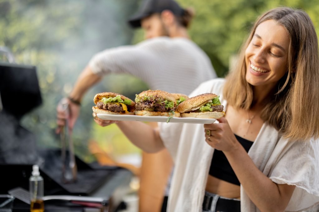 friends-making-burgers-on-a-picnic.jpg